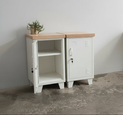 Pair of white mini lockers with oak in an office 