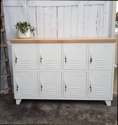 A white 8-door sideboard locker with an oak top, featuring multiple small lockers beneath the oak surface.