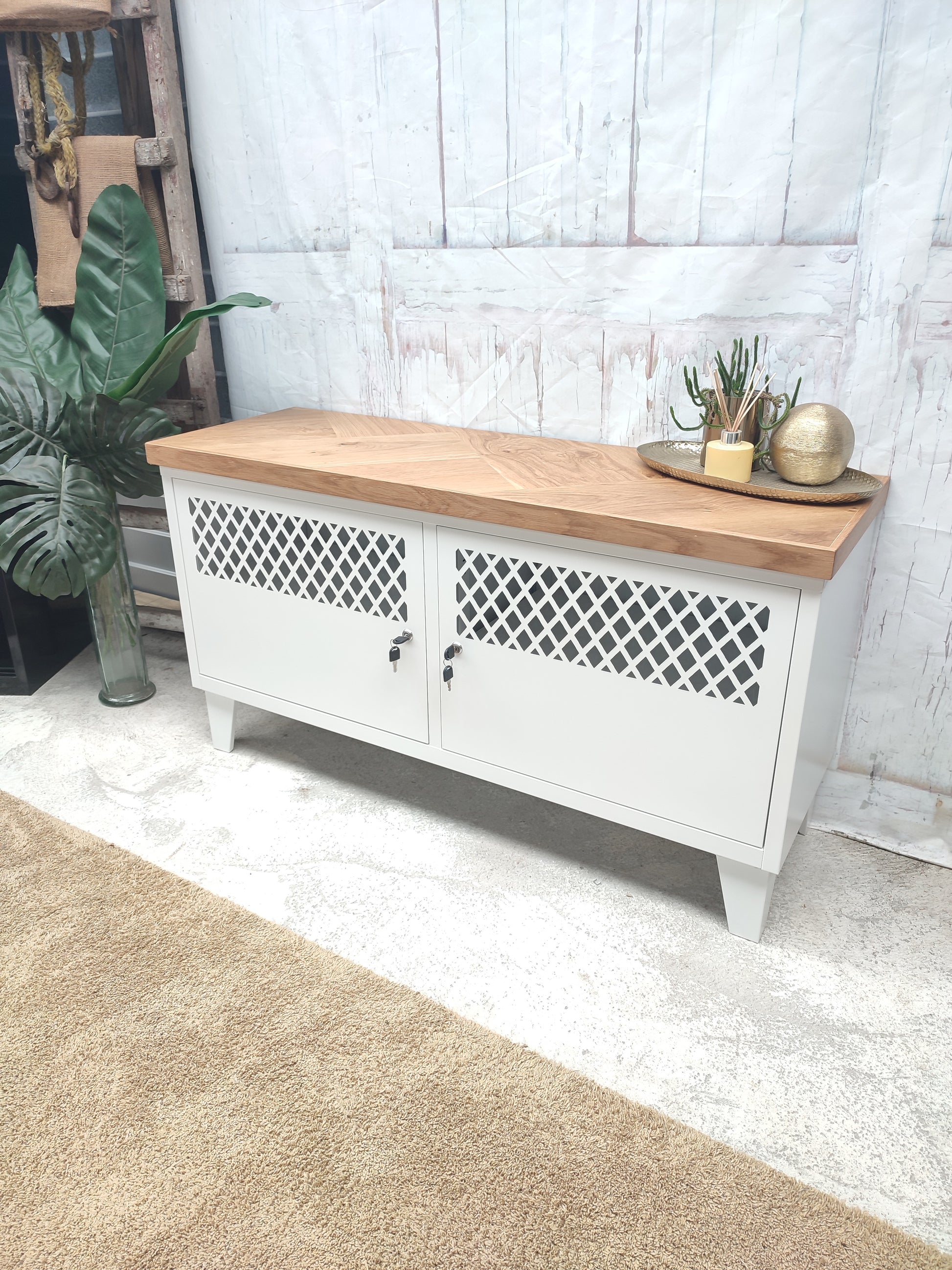 White metal TV cabinet with lockable  storage and herringbone Oak top